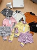 Alo American-style fitness sport yoga training outfit, slim-fit color-block long-sleeve top and shorts two-piece set